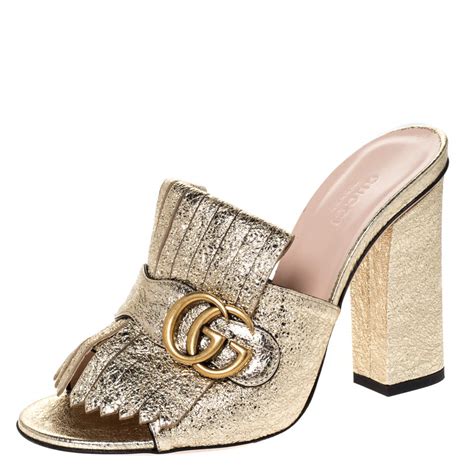 gucci metallic gold mules|Gucci black velvet mules.